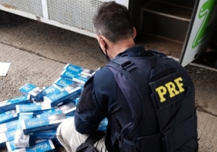 PRF localiza 150 mil maços de cigarros contrabandeados em ônibus com pintura escolar na BR 153 em Água Doce